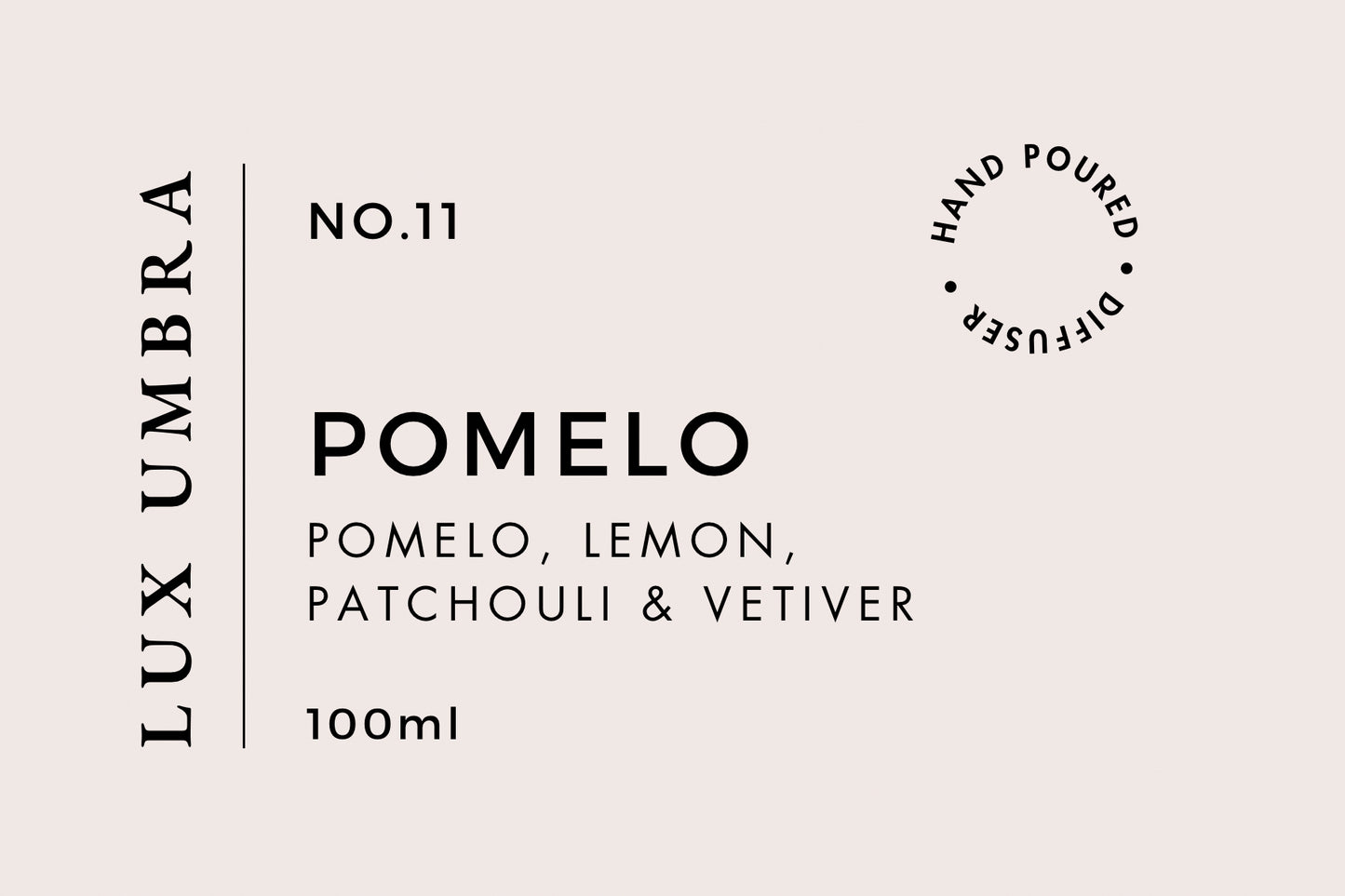 A label for a Lux Umbra diffuser with the scent of Pomelo. It indicates the product is hand poured and contains 100ml.