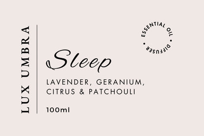 Lux Umbra Sleep essential oil diffuser label with ingredients and volume on a beige background