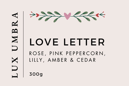 A candle label for a candle called love letter made by Lux Umbra