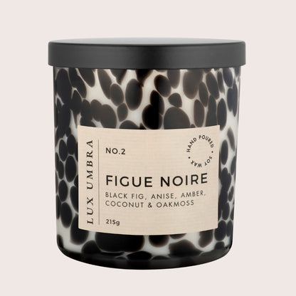 Black tortoiseshell called labeled Figue Noir by Lux Umbra, on a white background 