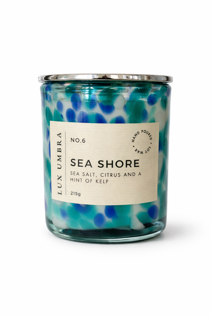A blue tortoiseshell pattern candle called sea shore
