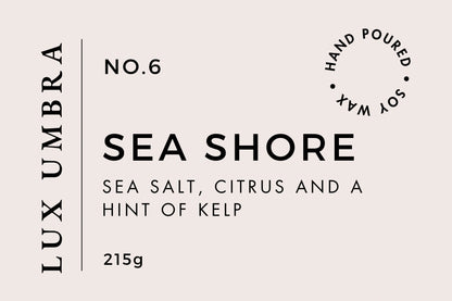 A candle label for a candle called sea shore
