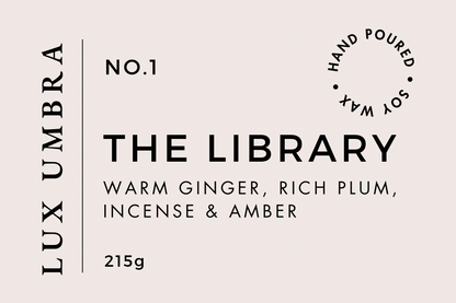A candle label for a scent called The Library by Lux Umbra. On a beige background 